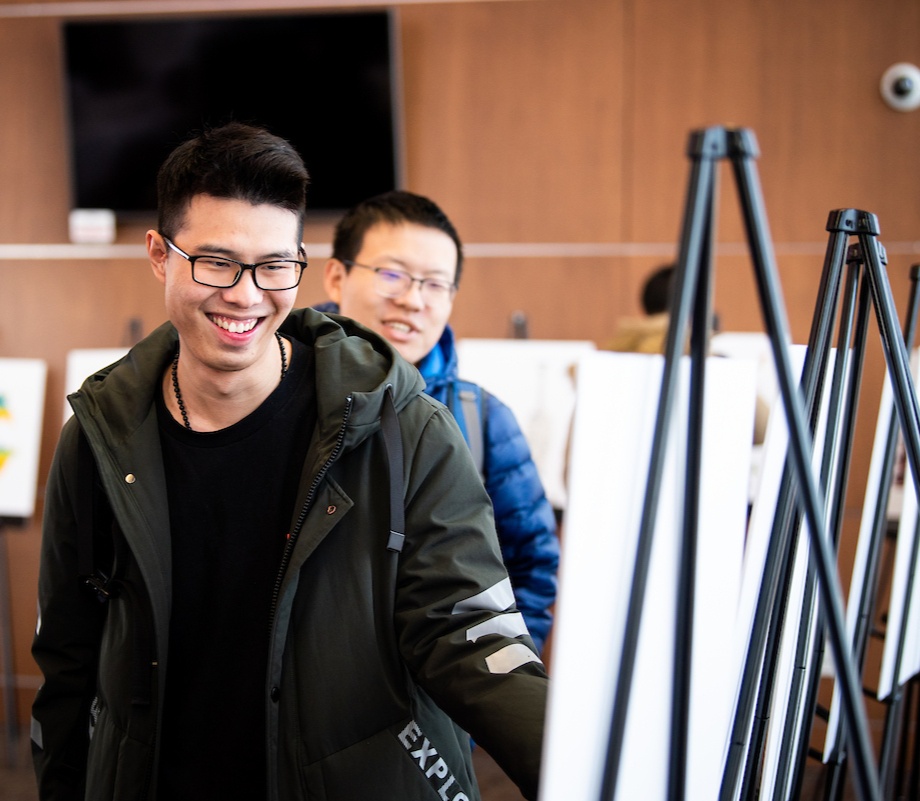 students looking at exhibit